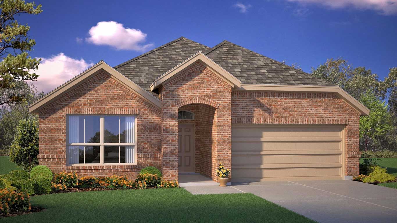 A single-story brick house with a two-car garage, large front window, and manicured lawn with shrubs and flowers, set against a blue sky with a few clouds.